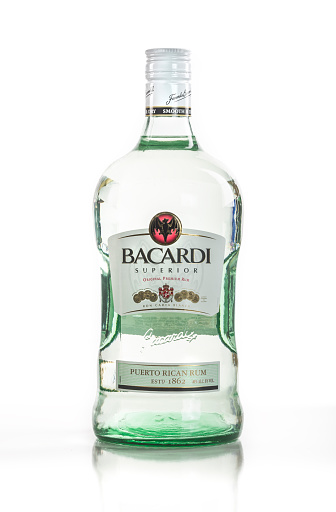 Miami, USA - October 7, 2015: A bottle of Bacardi Carta Blanca Rum isolated on white background.