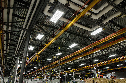 Ceiling of a manufacturing plant with lighting equipment