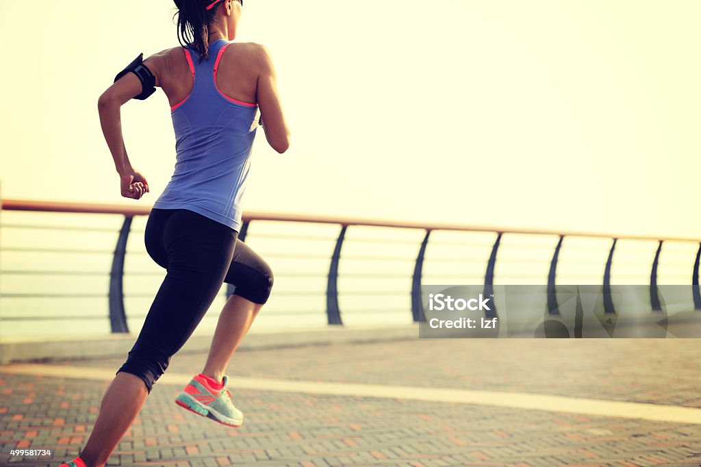 young fitness woman runner running at seaside 2015 Stock Photo