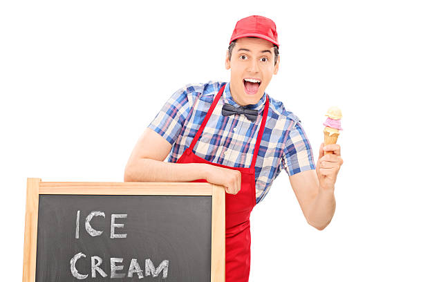 istock Ice cream vendor standing behind a blackboard 499583291