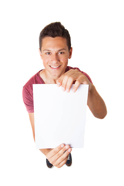 istock teen with blank white paper 499583937