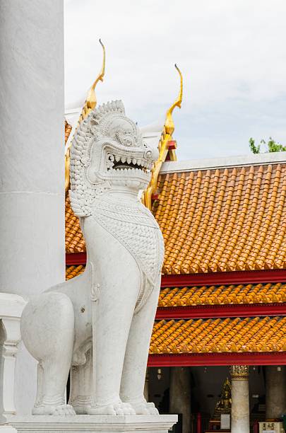 istock Lion statue in Buddhist temple / Lion statue 499584413