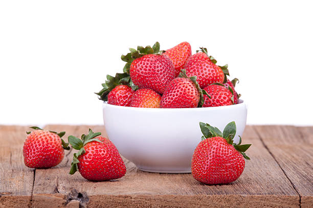 istock Fresh strawberries on wooden 499585719