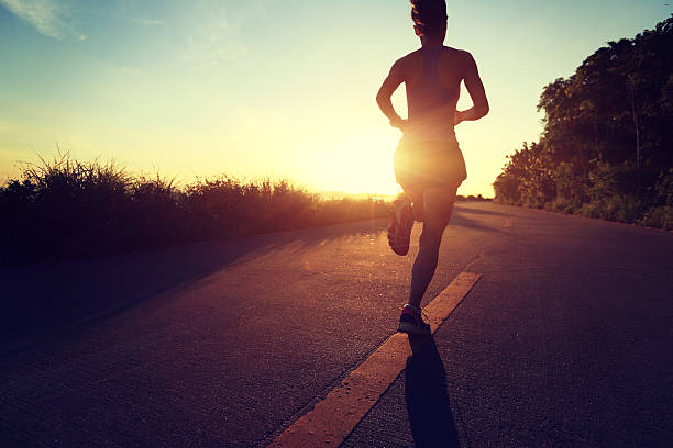 istock Runner athlete running at seaside road.vintage effect 499594704