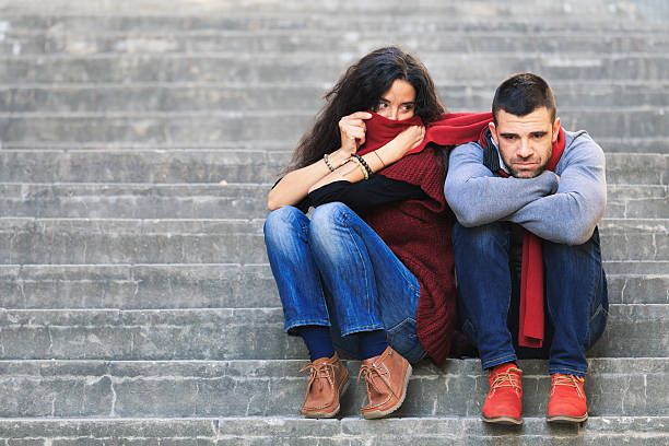 istock Young couple larking on stairs 499597078