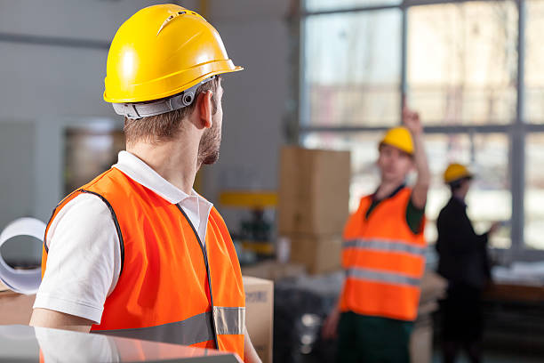 istock Workers during job in factory 499597253