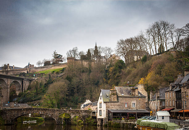 istock Old bridge over a river, Rance River, Dinan, Cotes-D'Armor, Brit 499598001