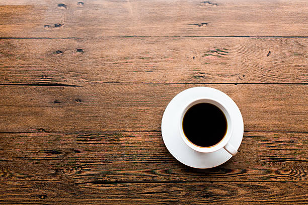 istock Coffee cup on the wooden table 499598252