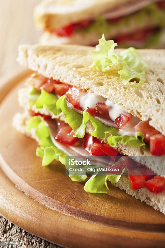 sandwich with ham tomato and lettuce Sandwich Stock Photo