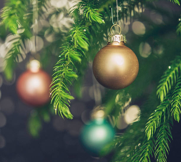 istock Pastel colored Christmas ornaments on Christmas tree branches 499599266
