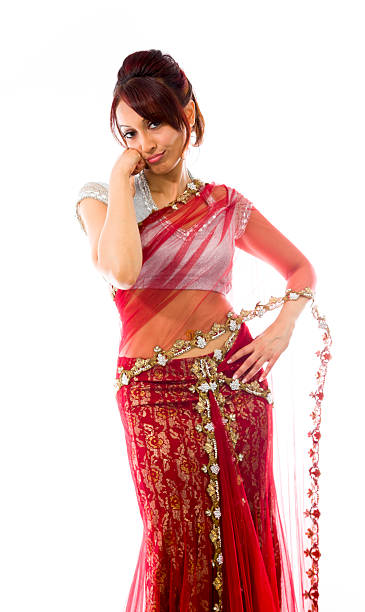 istock Sad young Indian woman standing with head in hands 499600299