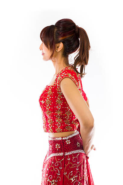 istock Side profile of an Indian young woman day dreaming 499600313