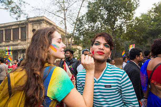 Delhi Queer Pride -2015 New Delhi, India - November 29, 2015: Delhi Queer Pride -2015 indian couple kiss stock pictures, royalty-free photos & images