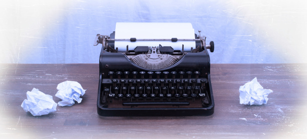 Vintage typewriter on wooden table, touch-up in retro style