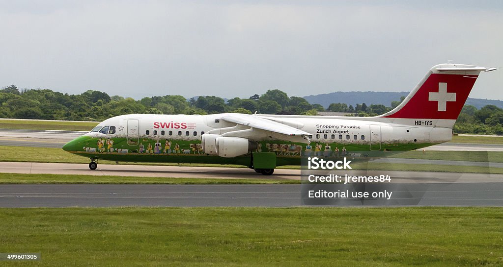 Swiss Airlines Avro 146 Manchester, United Kingdom - June 14, 2014: Swiss International Airlines Avro 146, Manchester International Airport runway. Swiss International Airlines CEO, Mr. Harry Hohmeister, has stated that European airlines must change their established structures in order to stay competitive. Air Vehicle Stock Photo