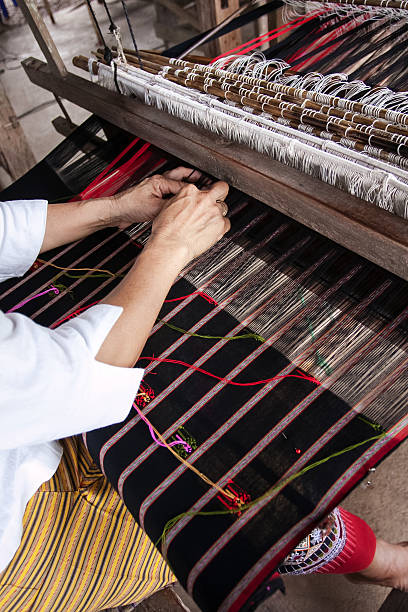 istock Process of weaving, dyeing, weaving ancient Thailand as silk 499602493