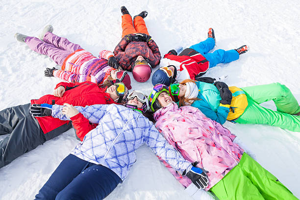 istock Cheerful happy friends lying in a circle 499602969