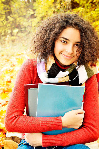 istock Female student in warm autumn 499603549