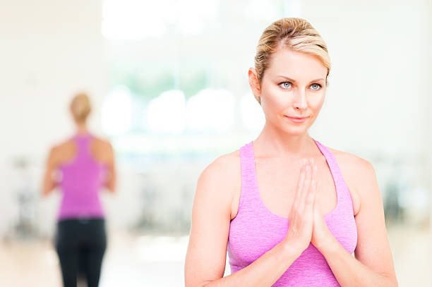 istock Blonde Woman Practicing Yoga 499603888