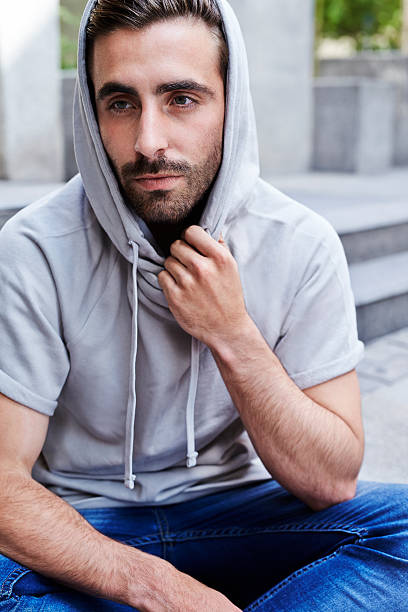 istock Thoughtful man in hoodie 499604134