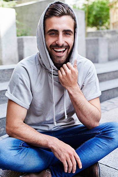 istock Laughing man in hoodie 499604172