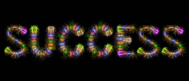 istock Success text colorful fireworks - motivational concept 499604690