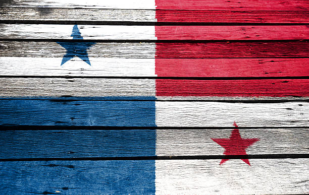 istock panama flag on wood background 499604746