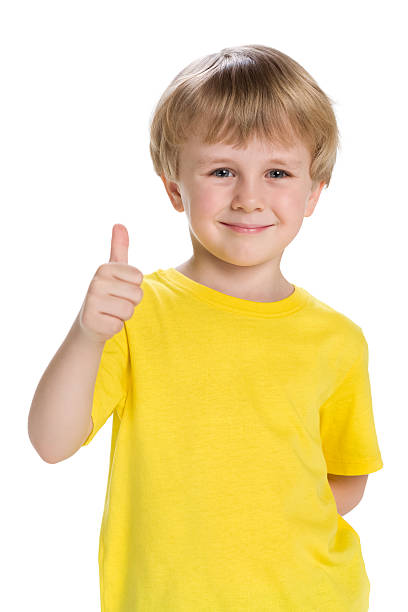 istock Cute little boy holds his thumb up 499607092