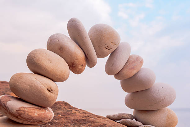 istock Arch of white pebbles 499607968