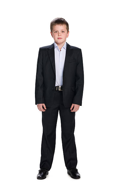 istock Handsome schoolboy in the suit 499607994