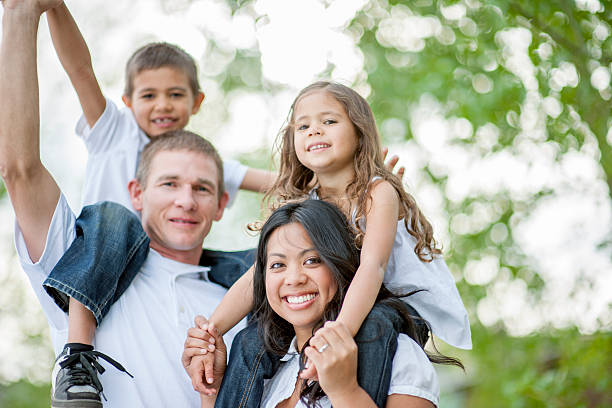 istock Family Walking Through the Park 499608480