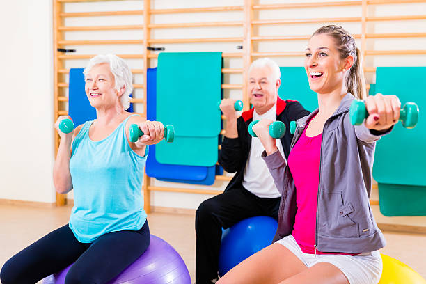 istock Group of people at physiotherapy 499608776