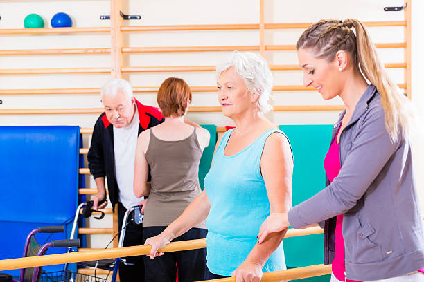 istock Seniors in physical rehabilitation therapy 499608908