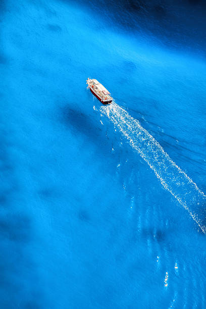 istock White motor boat against azure sea 499609254