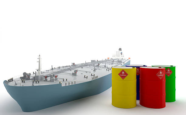 Oil Tanker and Barrels Barrels of oil next to an oil tanker. ganar stock pictures, royalty-free photos & images