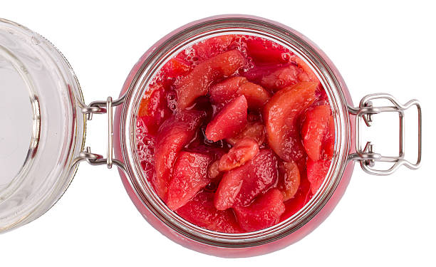 istock Jam pear in a glass jar on a 499618884