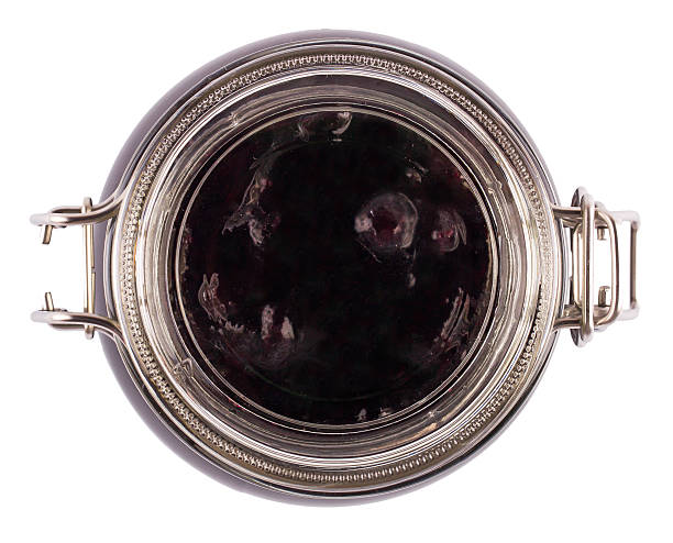 istock Currant jam in a glass jar on a 499618958
