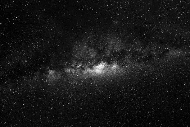 istock Milky way galaxy with stars on a night sky 499619782