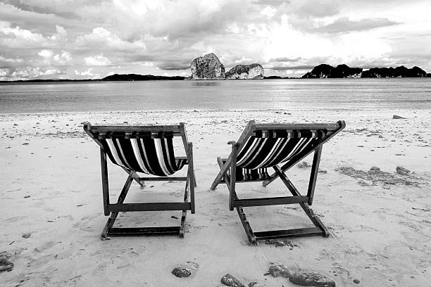 Deck chairs on a deserted beach