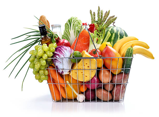 Many foods in market basket stock photo