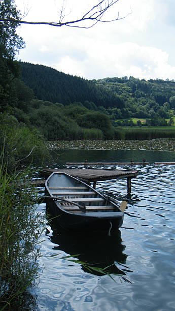istock Boat on Volcanic Lake 499621410