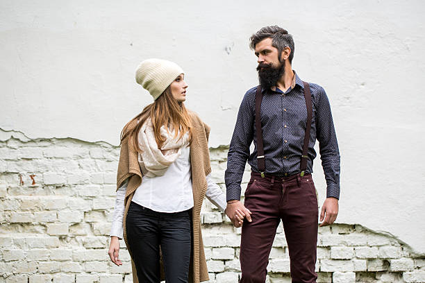 istock Young couple near wall 499621556