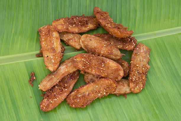 istock Fried banana on green banana leaf 499621927