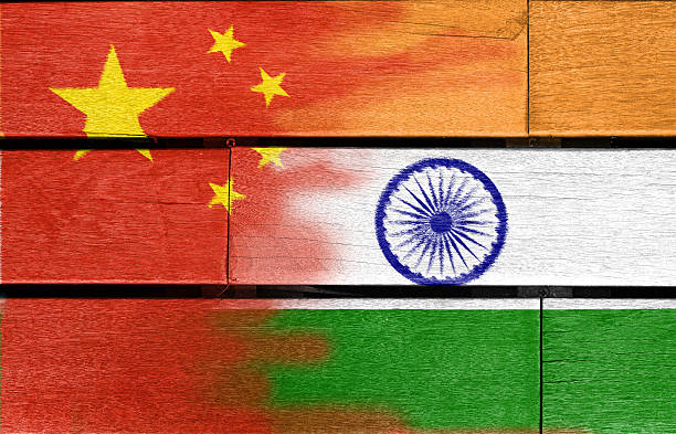 istock china and india flag on wood 499624306