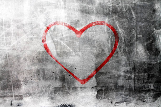 Heart on concrete wall stock photo