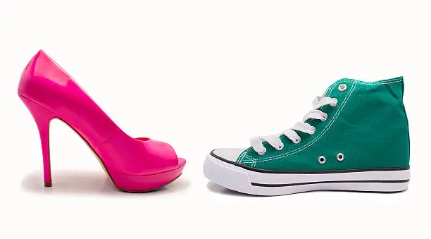 choice between feminine shoe and sneaker by profile over white background