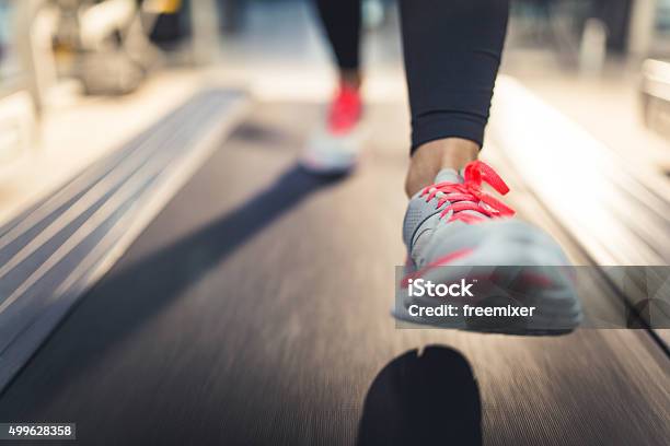 Closeup Of Athlete Shoes While Running On Treadmill Stock Photo - Download Image Now