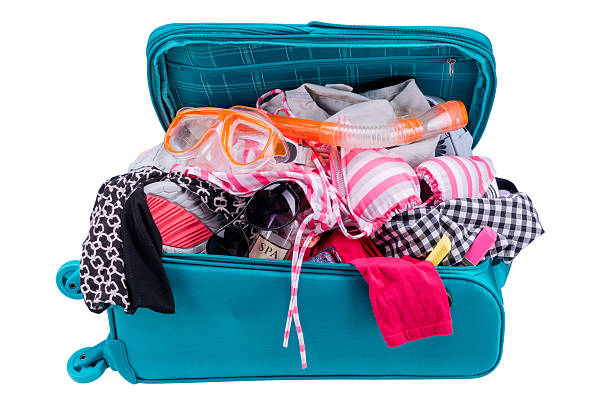 istock Packing to go on vacation isolated on white background 499628642
