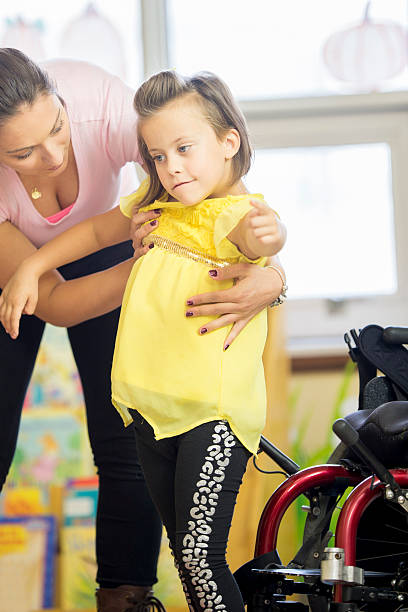 istock Little Girl Getting Physical Therapy 499628808