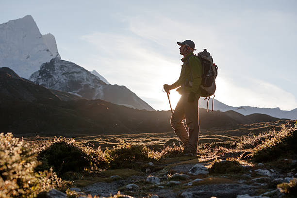 istock Hiker posing at camera on the trek in Himalayas, Nepal 499630446